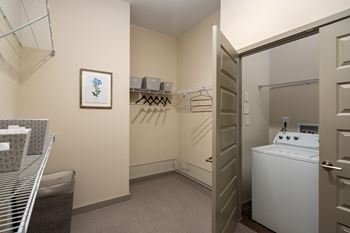 A laundry room with a washer and dryer.